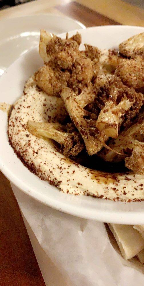 Hummus with fried cauliflower + pomegranate sauce